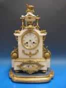 An alabaster gilt mounted mantel clock m