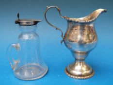 A George III hallmarked silver cream jug