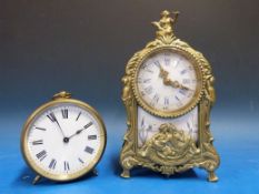A French brass mantel timepiece with ena