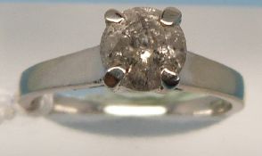 A white metal ring stamped 14K set with