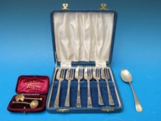 A hallmarked silver teaspoon, cased pair