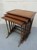 A mahogany nest of three tables (largest