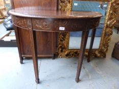 A Shoolbred mahogany demi-lune side tabl