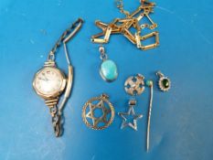 A hallmarked 9ct gold pendant, a yellow