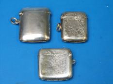 Three hallmarked silver vesta cases 62g