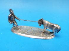 A silver plated novelty model of a reluc