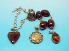 A sterling silver charm bracelet with a