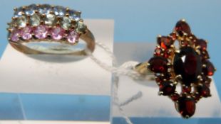 Two 9ct gold rings, one set with garnets