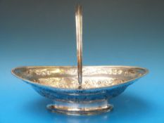 An embossed Georgian silver basket with