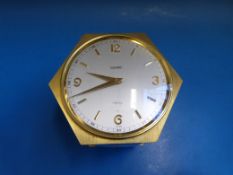 A very unusual hexagonal timepiece compe