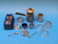 Four various hallmarked silver napkin ri