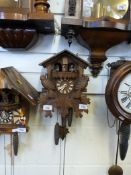 A circa 1960 three train cuckoo clock wi