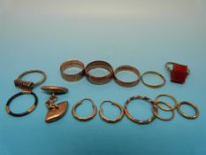 Three hallmarked gold wedding bands, a 9