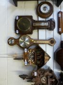 A banjo style aneroid barometer together