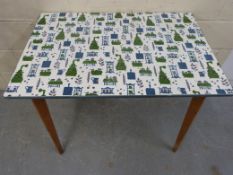 A retro 1960s kitchen table possibly Hab