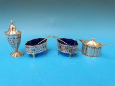 A hallmarked silver cruet set comprising