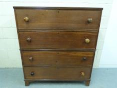 A Georgian chest of four long drawers wi