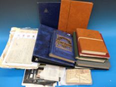 A large box of stamp albums, stock books