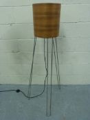 A retro stainless steel and bentwood sta