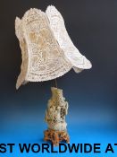 A large Chinese carved soapstone lamp