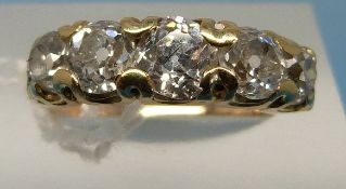 A Victorian/ Edwardian ring set with fiv