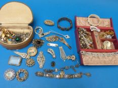 A collection of brooches, bracelets etc