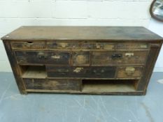 A 19thC pine haberdashery cabinet fitted