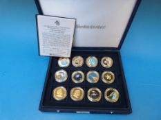 A cased set of enamelled modern crowns c