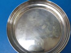 A feature hallmarked silver wine bottle