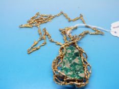 A 9ct gold bark textured necklace framin