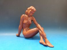 An Austrian G K figure of a reclining nu