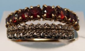 Two 9ct gold rings, one set with garnets