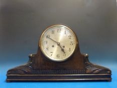 A large oak cased 'Napoleon hat' mantel