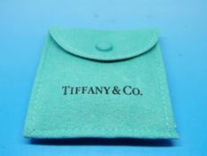 A pair of white metal Tiffany cufflinks