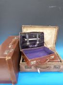 Four various vintage suitcases/attaché c