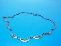 A hallmarked 9ct gold necklace with demi