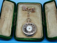 A ladies' 9ct gold cased half hunter fob