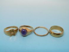 An 18ct gold ring set with a diamond in