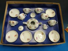 A boxed miniature / child's tea set with