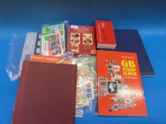 A box of stamps comprising albums, loose