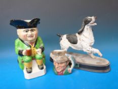 A Beswick spaniel on plinth, Doulton Poa