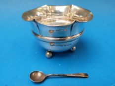 A silver fluted bowl on bun feet (7.5cm