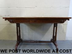 A Victorian mahogany and satinwood sofa