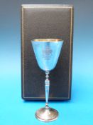 A cased silver goblet commemorating the