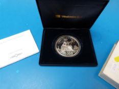 A cased 2009 5oz Britannia coin commemor