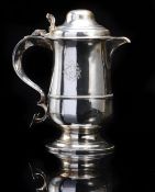 A Georgian white metal two pint lidded t