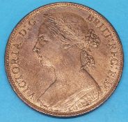 An 1885 Young Head Victorian penny, near