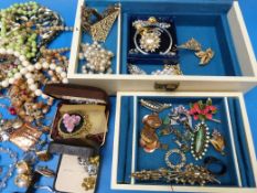 A hallmarked silver locket, a round silv