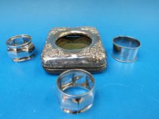 Three hallmarked silver napkin rings, 39