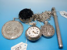 A silver pair cased pocket watch on chat